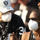 Raiders fan wearing breathing masks during last week’s game against the Chargers.